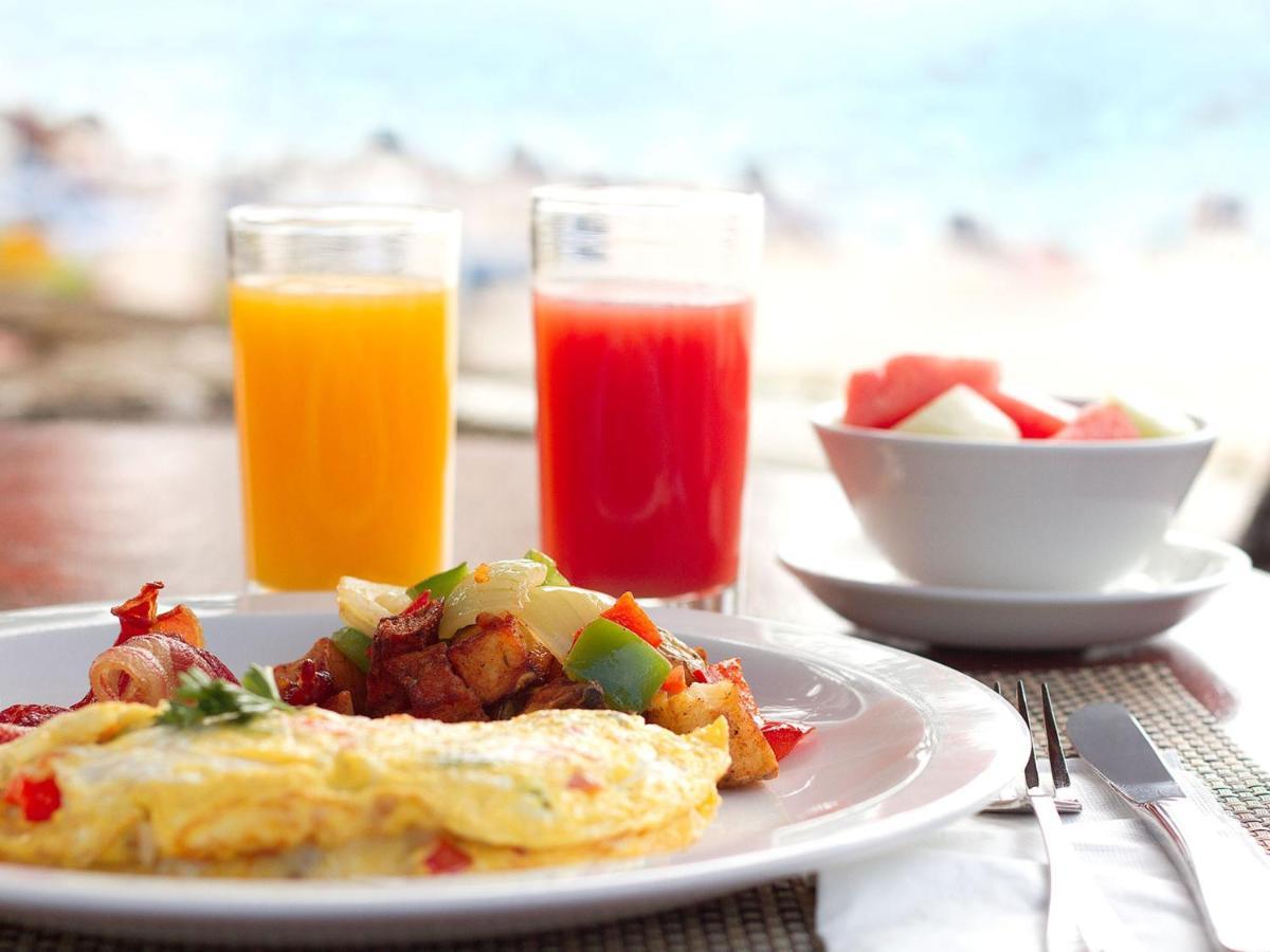 Coconut Court Beach Hotel Christ Church Bagian luar foto